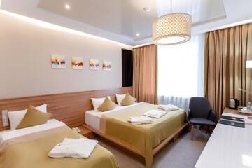 Улучшенный семейный номер в Отеле Mildom Premium Hotel